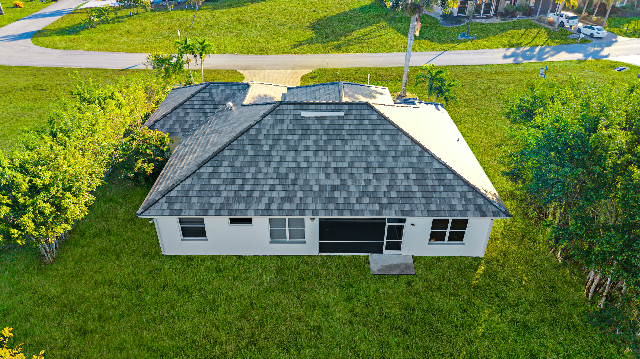 Victor residence backview — Gydn Roofing